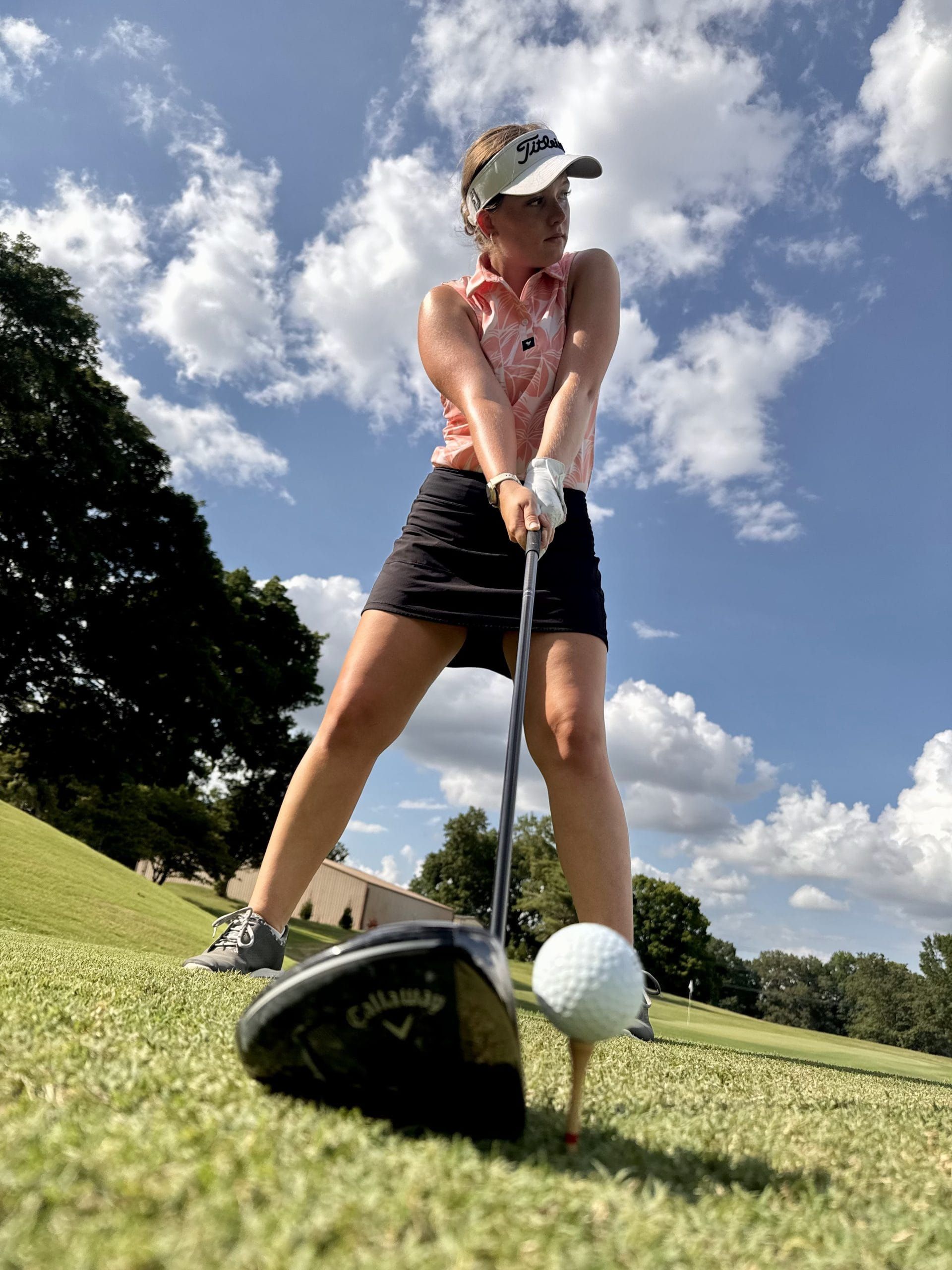 Lily Hyams at address with her driver